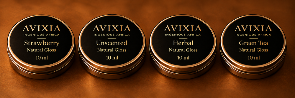 Four gloss tins in Rose, Unscented, Herbal and Green Tea, 15 ml each